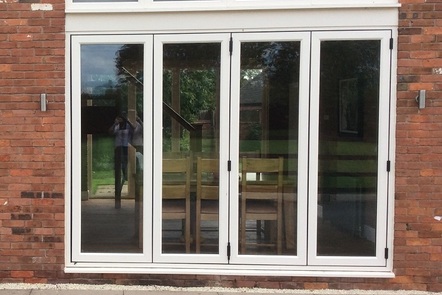Cream Woodgrain PVCu Bi-folding Door Cream Woodgrain PVCu Bi-folding Door,
