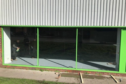 After - Completed glazing shop window, 
