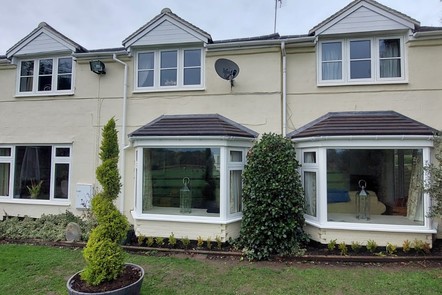 Ivory White FlushFit Windows with Tapco Roof Tiles, 